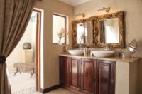 Looking onto the outdoor shower in your suite